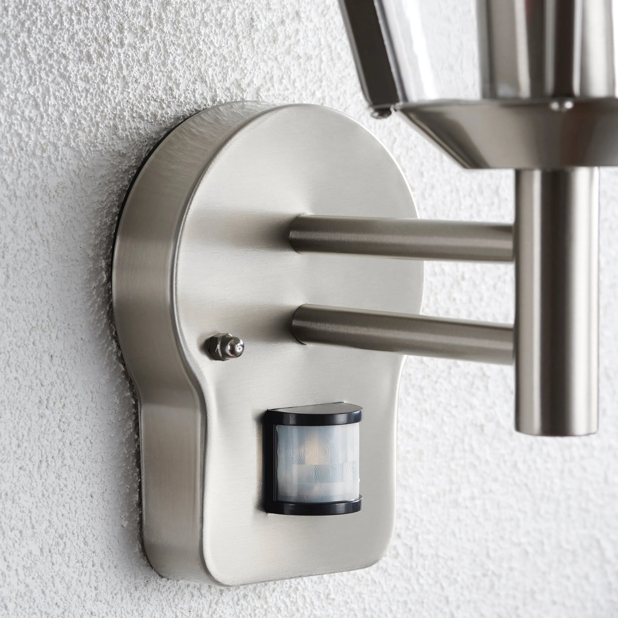 Saxby 49945 Inova PIR 1lt wall IP44 15W Brushed stainless steel & clear pc 15W LED E27 (Required)