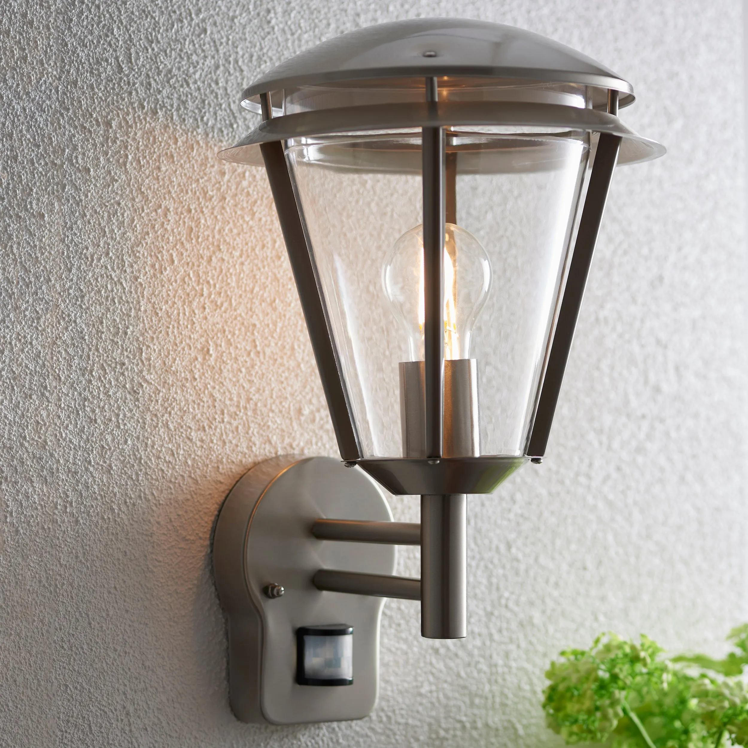 Saxby 49945 Inova PIR 1lt wall IP44 15W Brushed stainless steel & clear pc 15W LED E27 (Required)