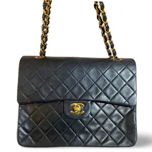 Vintage CHANEL black lambskin classic 2.55 double flap shoulder purse with golden chain straps. Make you even more chic. 061203ac1