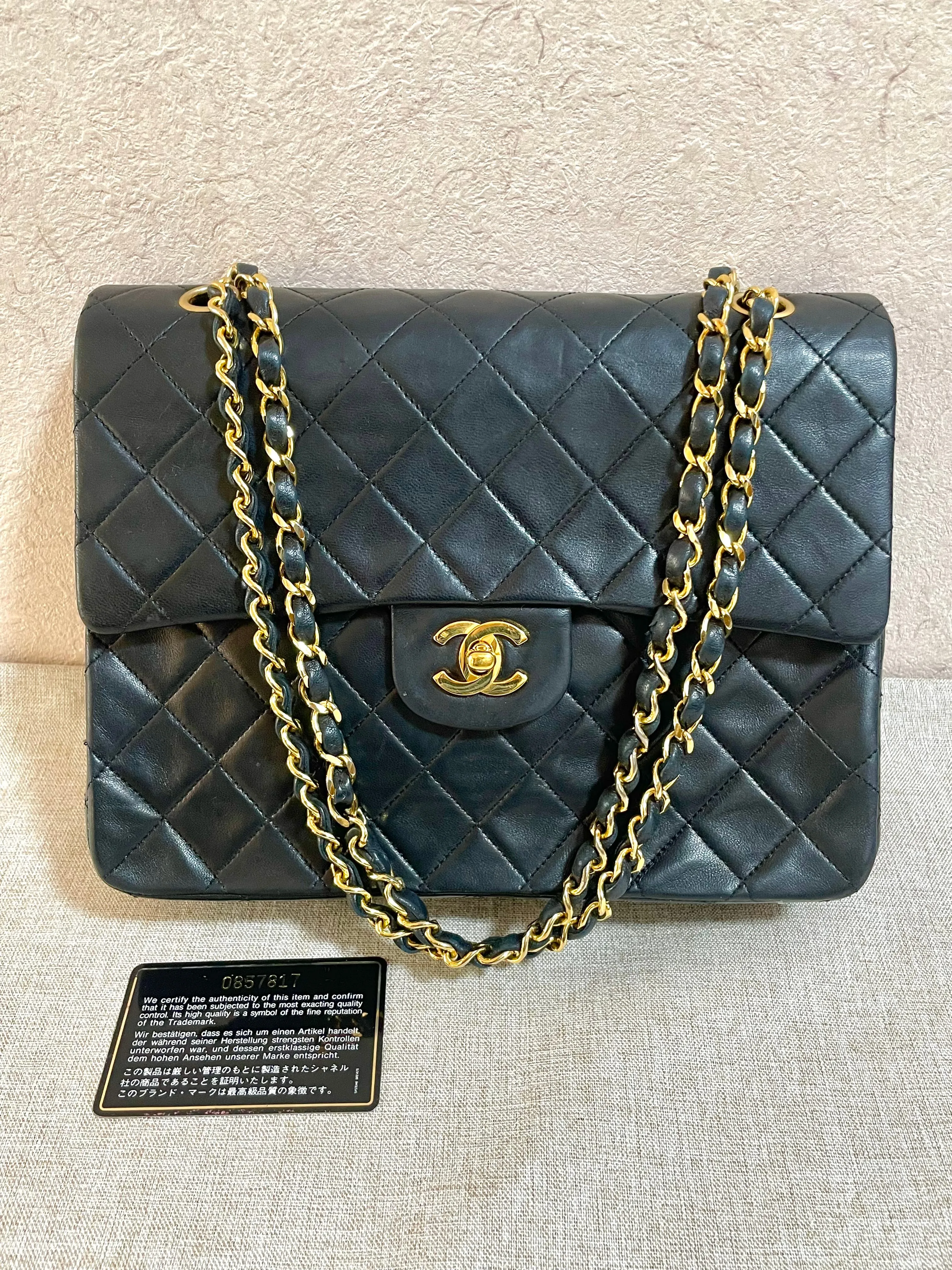 Vintage CHANEL black lambskin classic 2.55 double flap shoulder purse with golden chain straps. Make you even more chic. 061203ac1