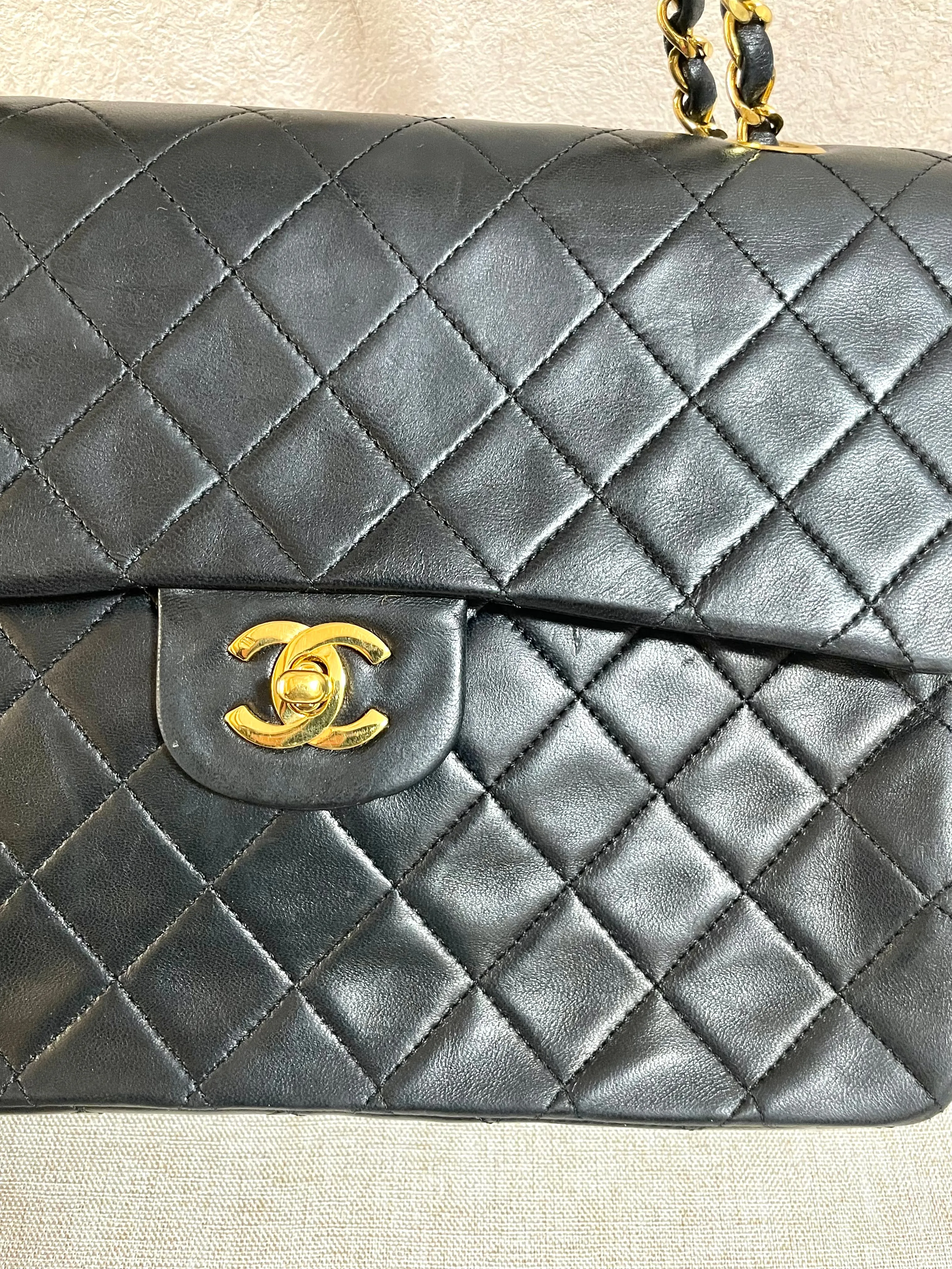 Vintage CHANEL black lambskin classic 2.55 double flap shoulder purse with golden chain straps. Make you even more chic. 061203ac1